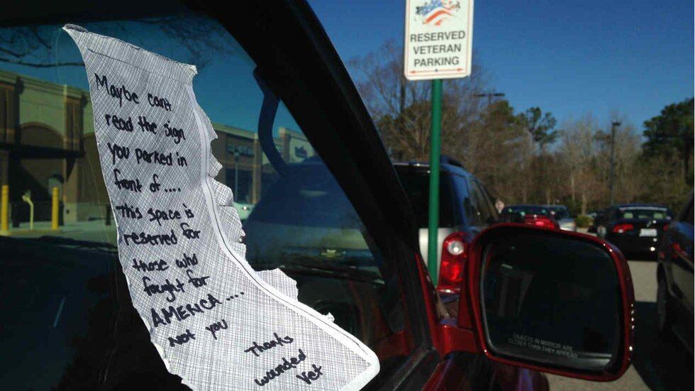It read, "Maybe [you] can't read the sign you parked in front of. This space is reserved for...