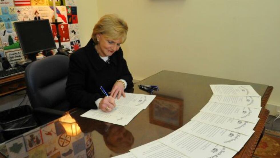 Outgoing Governor Bev Perdue signed a Pardon of Innocence for the Wilmington 10 Monday.
