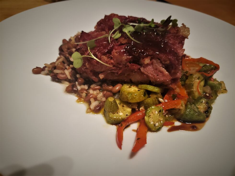 One of the best pork dishes I've ever had. Perfectly cooked pork shoulder with a medley of...