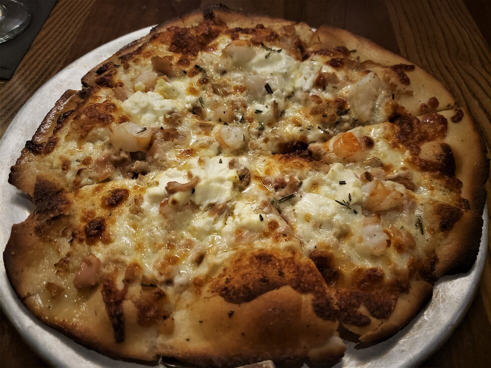 Shrimp, clams, aflredo sauce, rosemary, fresh ricctta & mozzarella makes up this light yet...
