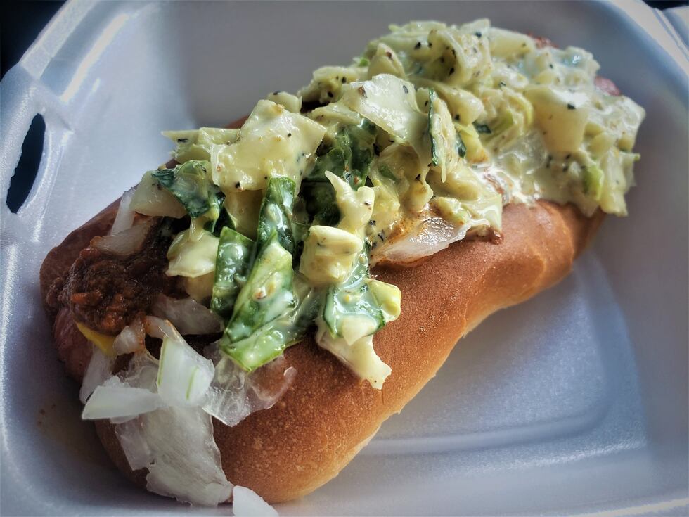 Near perfection on a bun, this hot dog has it all. Split top, toasted bun, finely diced...