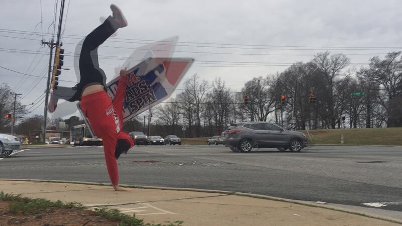 Charlotte man headed to Las Vegas to compete in sign spinning competition.