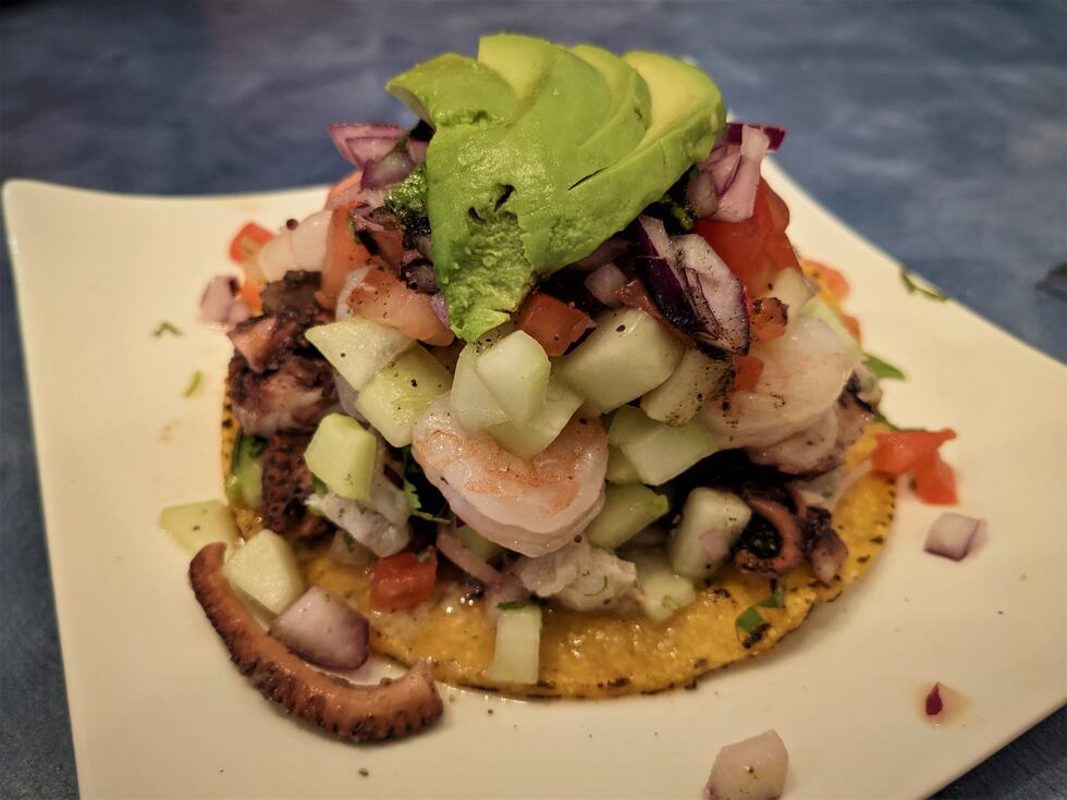 This is not your abuela's typical tostada. Piled high with fresh seafood like shrimp, fish,...