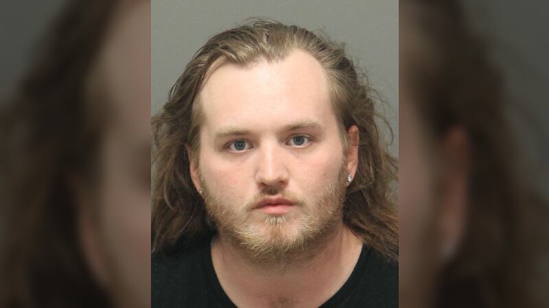 A pregnant woman was shot in the head while in the back of her car near an east Raleigh...
