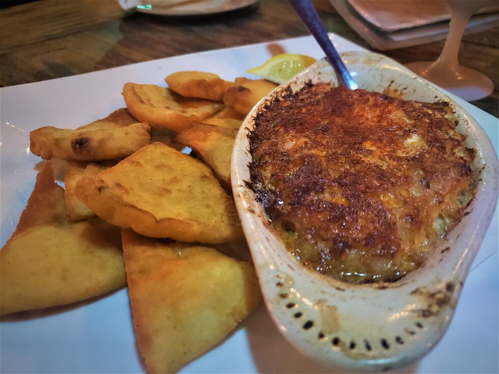 Loaded with crab and shrimp, this heavy dip packs a flavor punch with crispy pita chips.