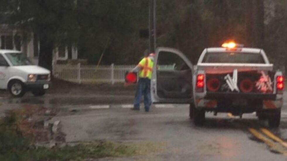 Crews setting up a safe work zone.