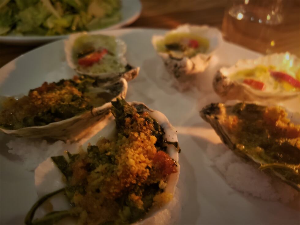 Two variations of broiled oysters offer different flavor profiles, but a mix of both is well...