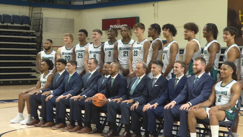 The UNCW men's basketball team poses for pictures during media day on Tuesday, Oct. 4.