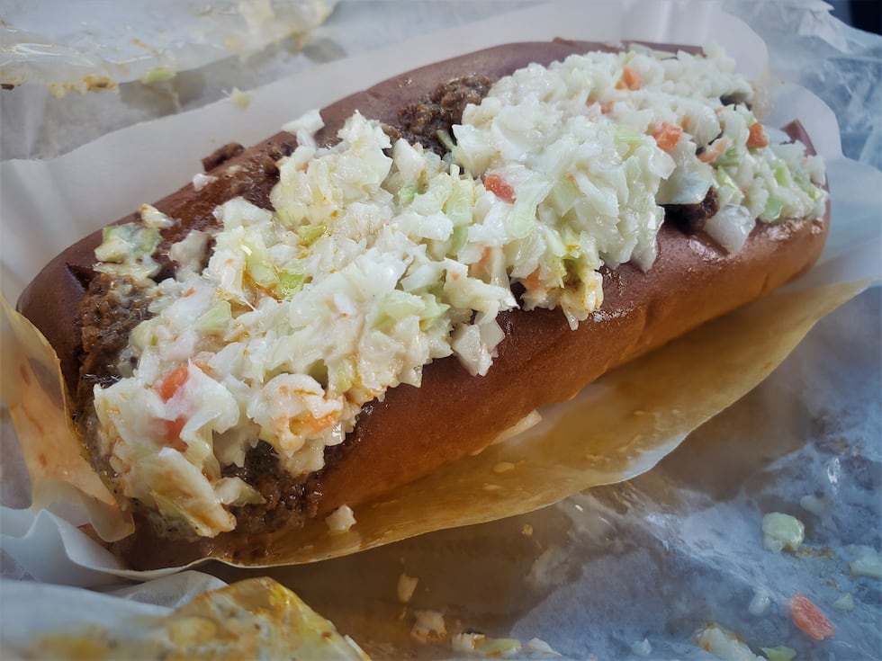 Near perfection, the bun, slaw, chili and sausage combine to create a timeless hot dog that...