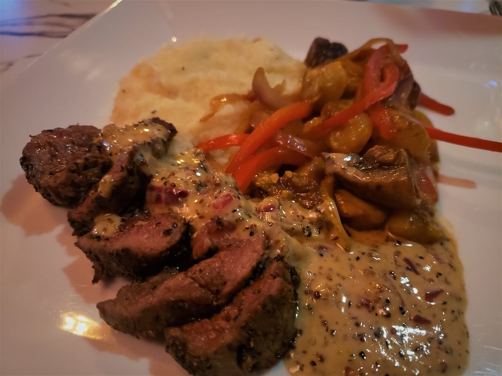 The Vine offers a well-priced wine list with charcuterie, flatbreads, tapas and entrees.