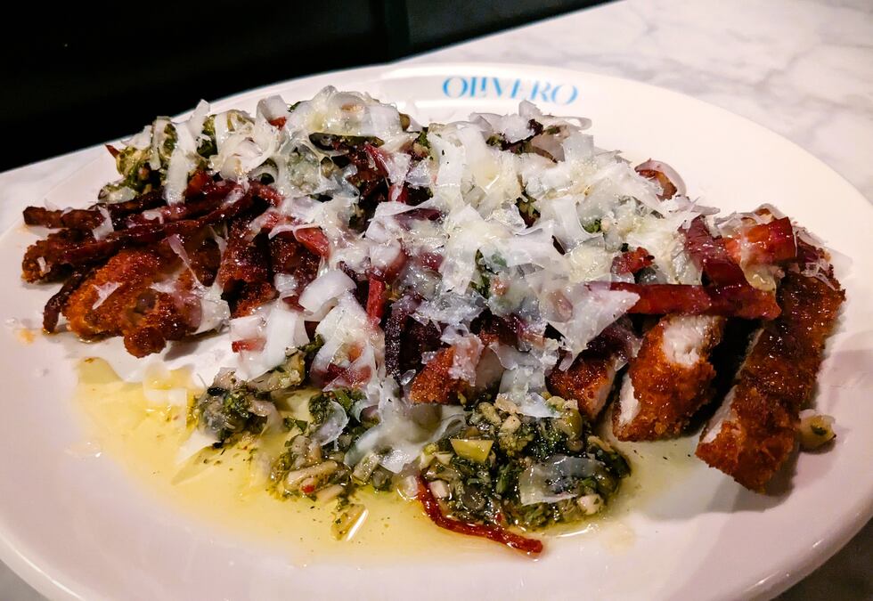 Easily enough for two, the Chicken Milanese is fried to perfection, with pieces of savory...