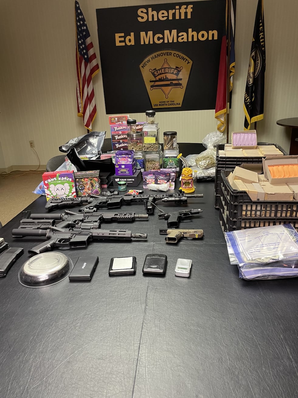 "Several firearms were also confiscated that ranged from handguns to high-caliber AR-15 style...