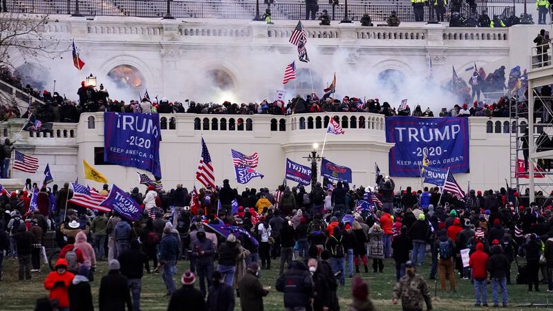 FILE - Violent insurrectionists loyal to President Donald Trump storm the U.S. Capitol, Jan....