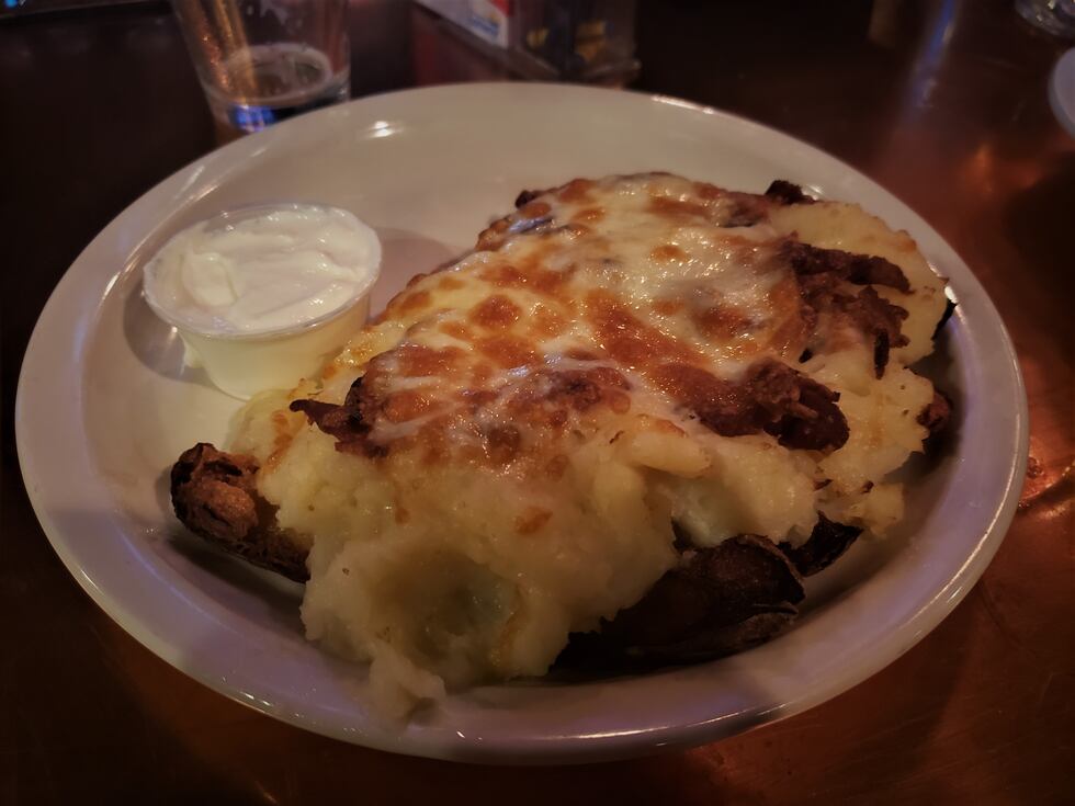 I can't vouch for the authenticity of this dish, but fried potato skins, mashed potatoes,...