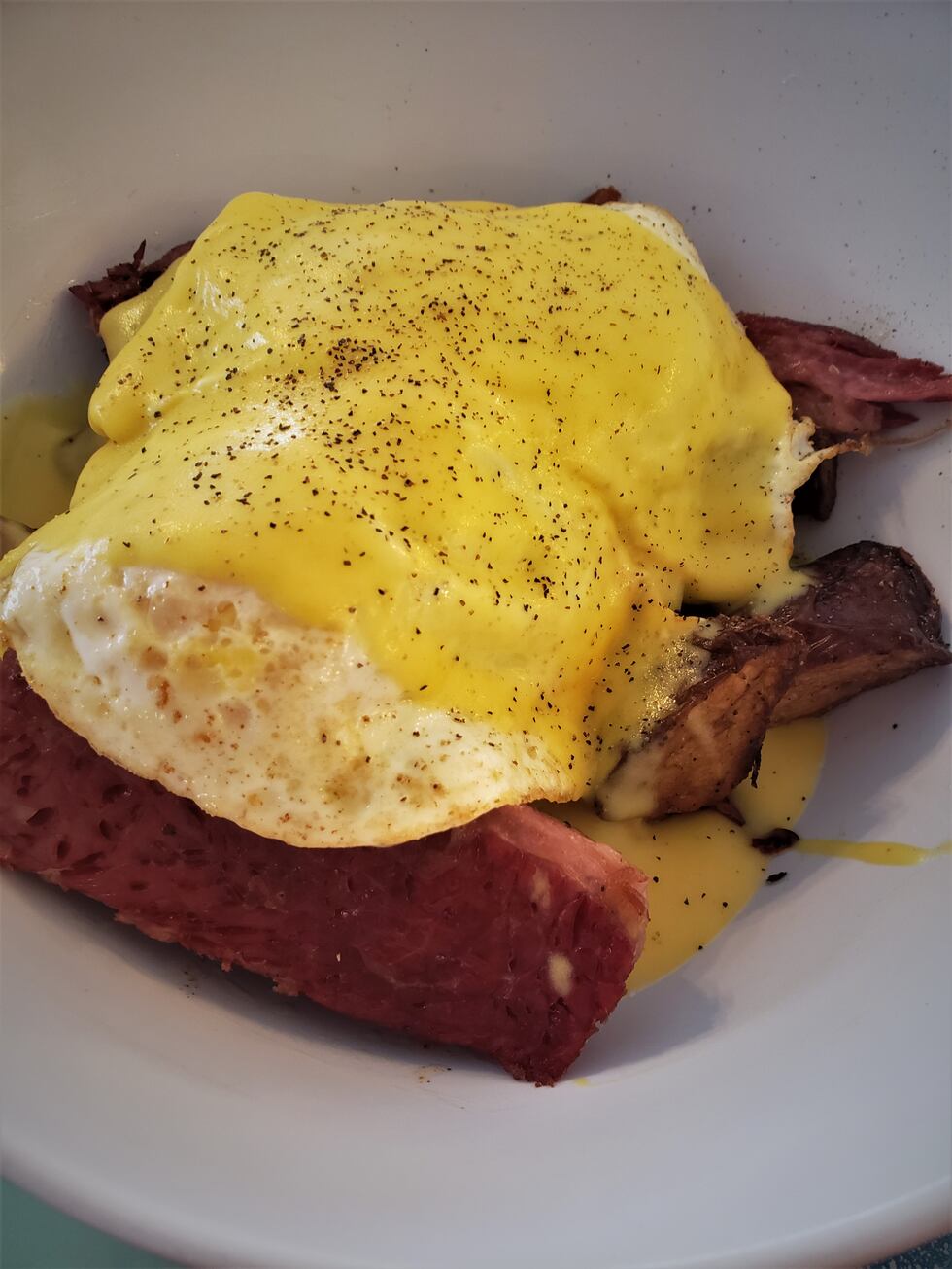 Savor's "Let’s Hash it Out Bowl” has big chunks of braised corned beef, with potatoes, eggs...