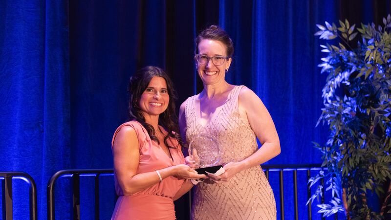 Michaela Howells (pictured on the left), associate professor in the UNCW Department of...