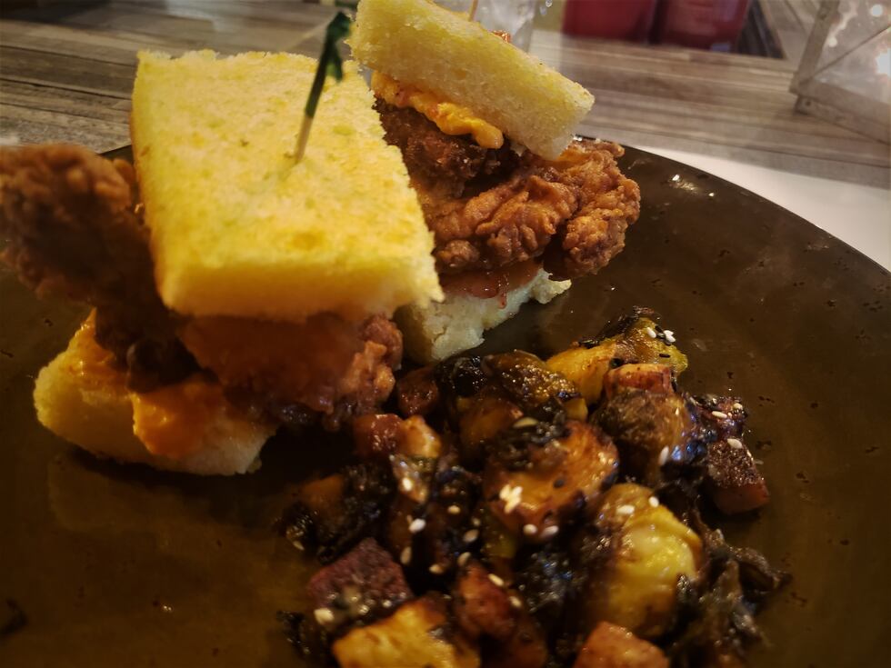 A different take on the chicken sandwich wars, the sweet cornbread supports a crispy and salty...