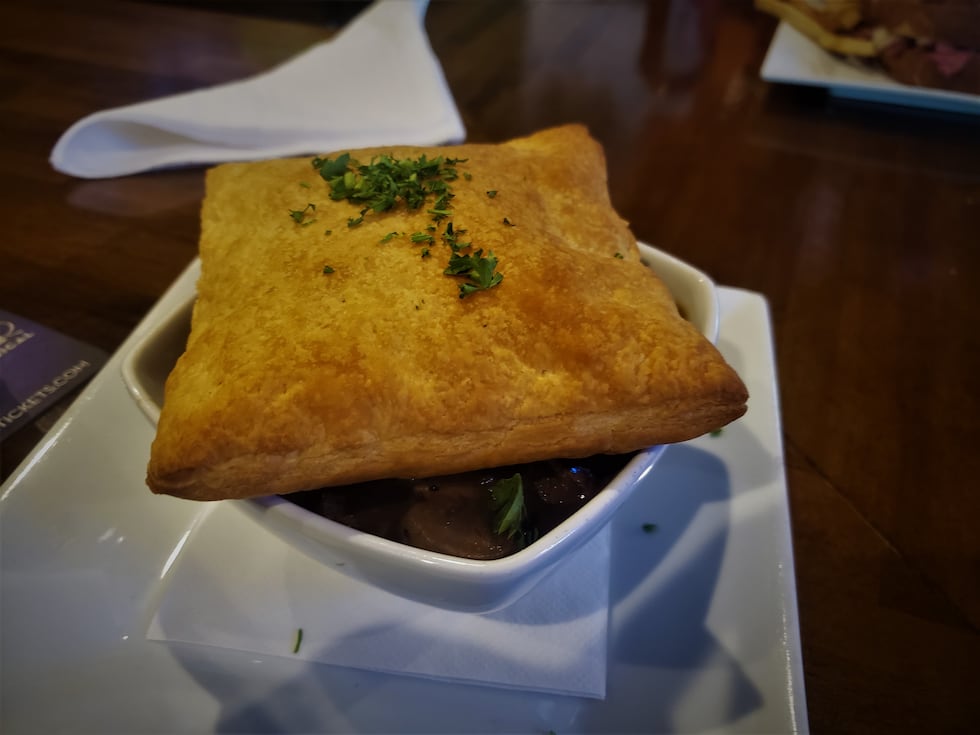 Rich, decadent, and packed with tender beef tips with root vegetables and topped with a puff...