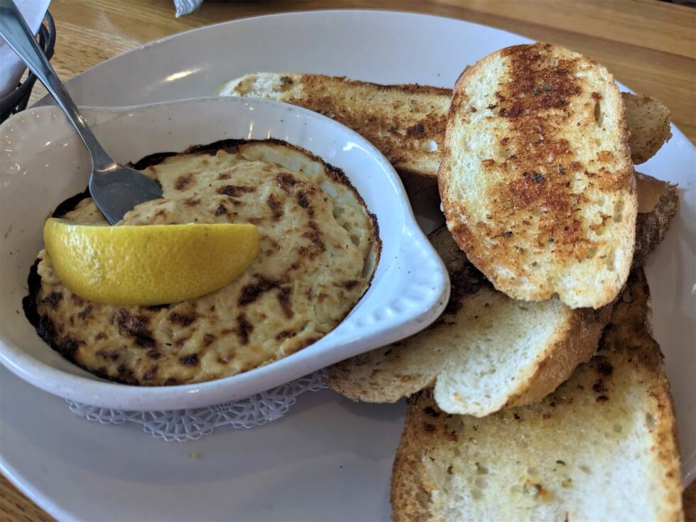 A bowl of cheesy, creamy dip filled with chunks of lump crab meat is the perfect dish when...