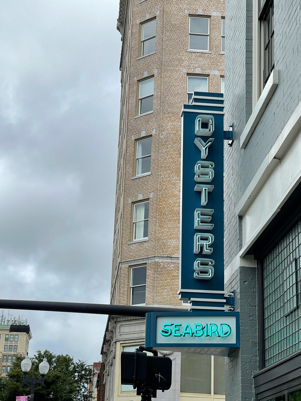 The soft glow of blue neon welcomes you to this masterfully renovated building in the heart of...