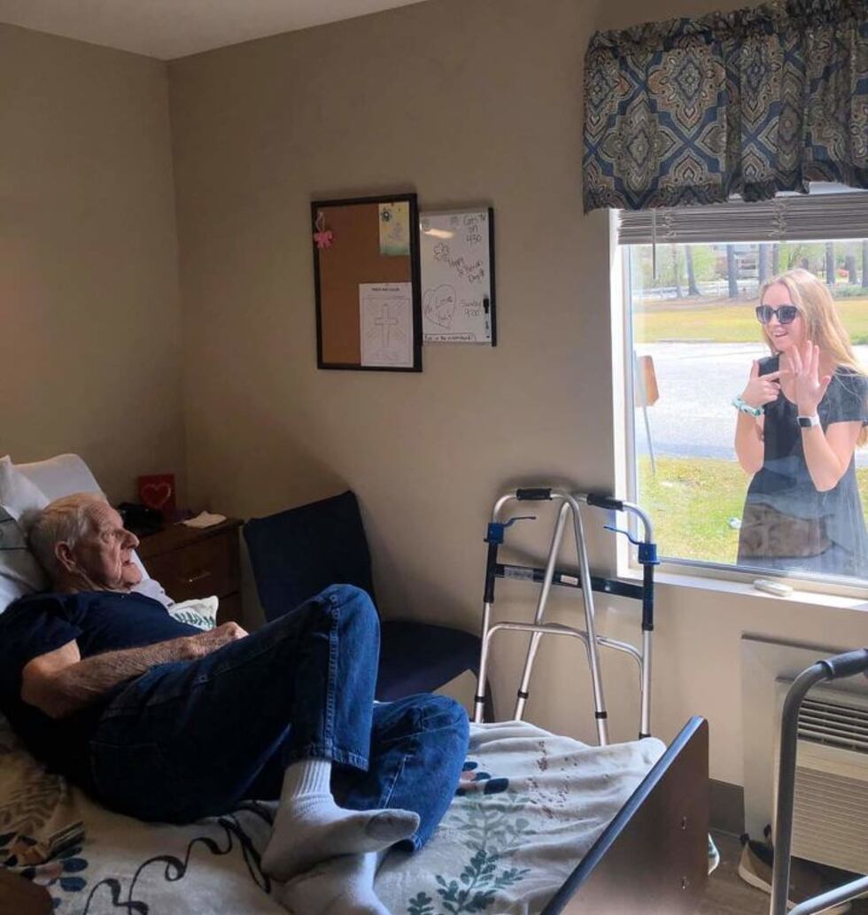 A granddaughter who can't go into her grandfather's care facility due to the coronavirus...