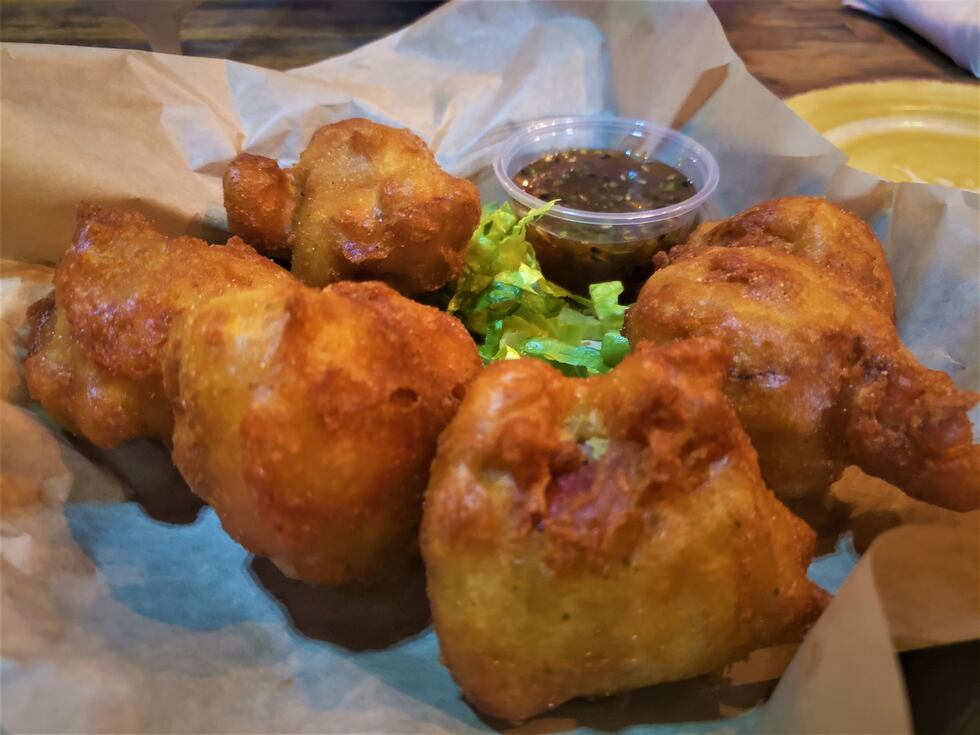 This could act as a meal by itself, deep fried golden nuggets of bacon wrapped shrimp and...