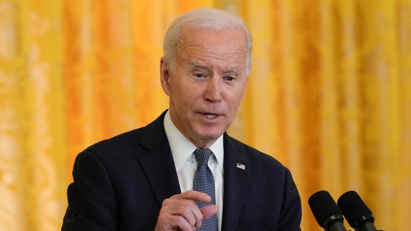 President Joe Biden speaks during a news conference with French President Emmanuel Macron in...