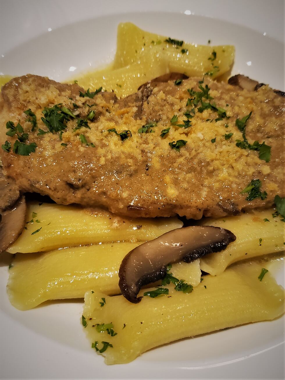 Rich marsala sauce, lightly breaded chicken, mushrooms, ricotta filled rigatoni, bread crumbs...