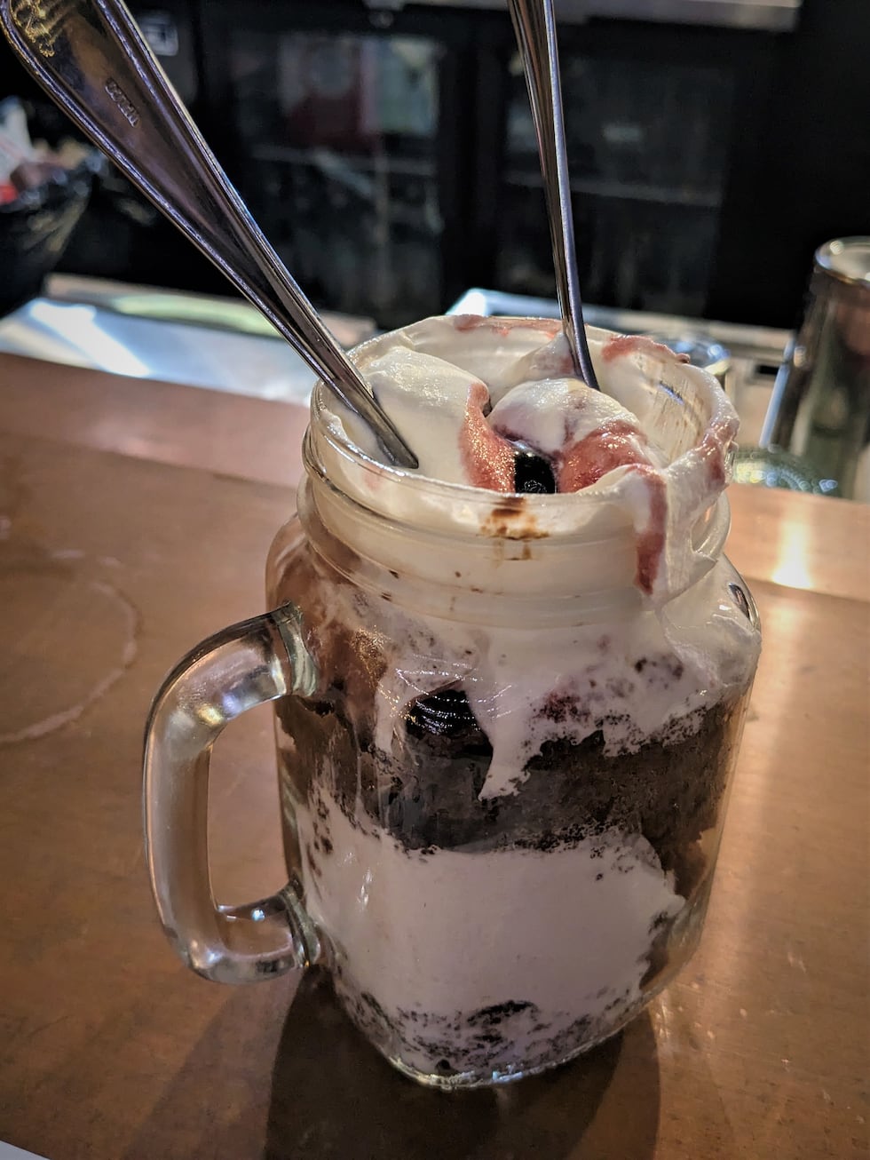 A mixture of Black Forest cake, cream, ice cream, and cherries offers a delightful respite...