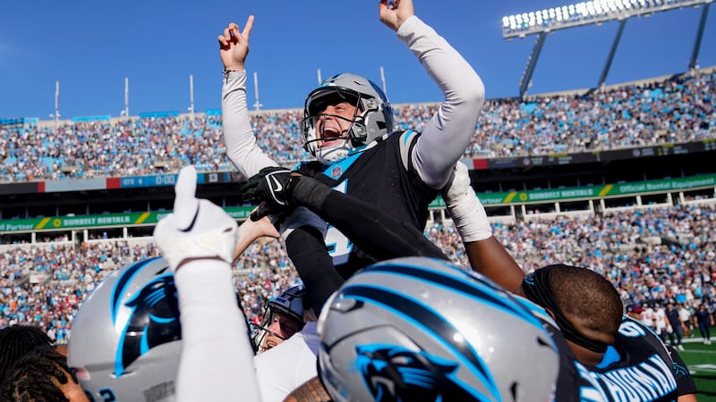Carolina Panthers' Eddy Pineiro (4) celebrates after kicking the game-winning field goal after...