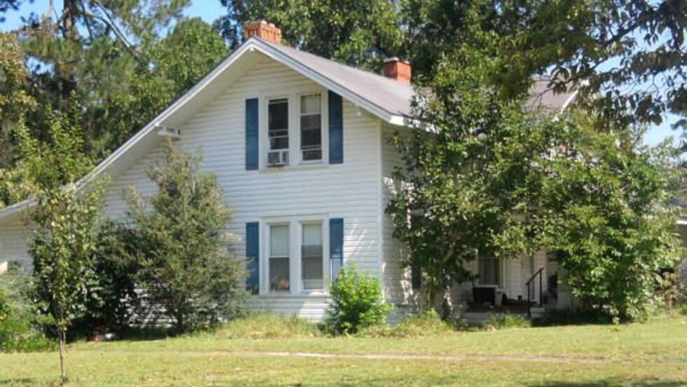 According to neighbors, several dogs lived in the home including a Rottweiler and a Pit Bull.